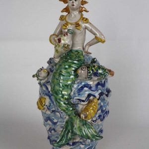 Sirena con pesce fischiante